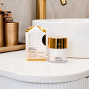 Jojoba ultimate night cream packaging on a bathroom counter